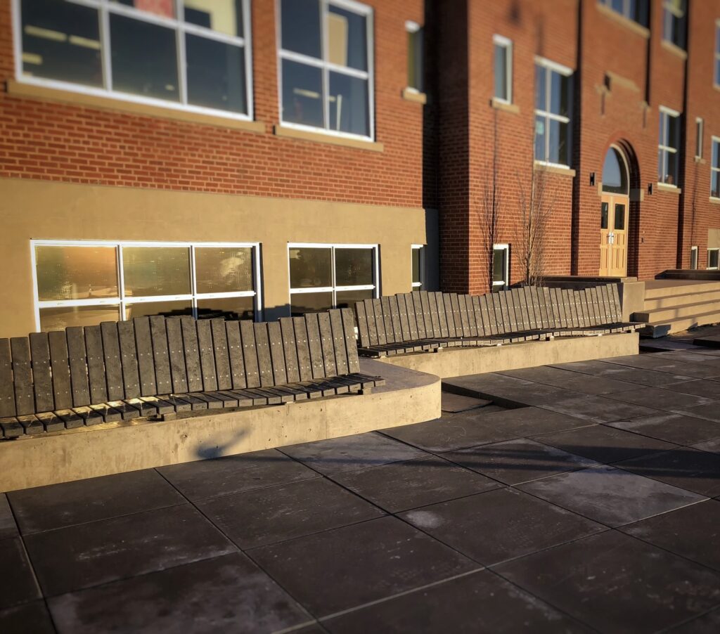 Commercial benches using plastic lumber